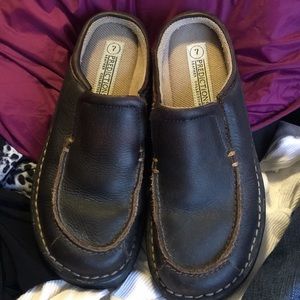 Brown leather slip ons